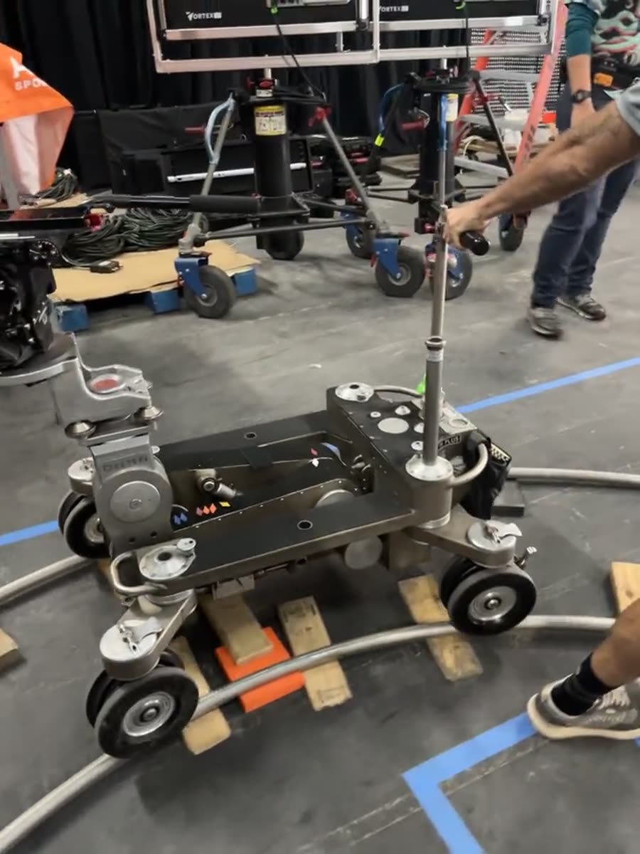 Dolly riding a custom-bent circular camera track