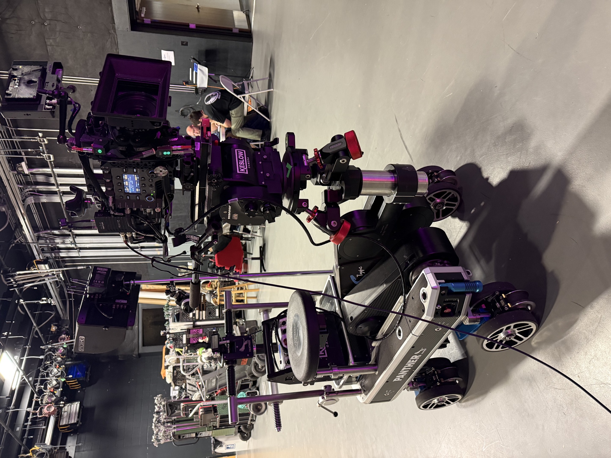 Panther S-Type dolly with full camera build in a purple-lit studio