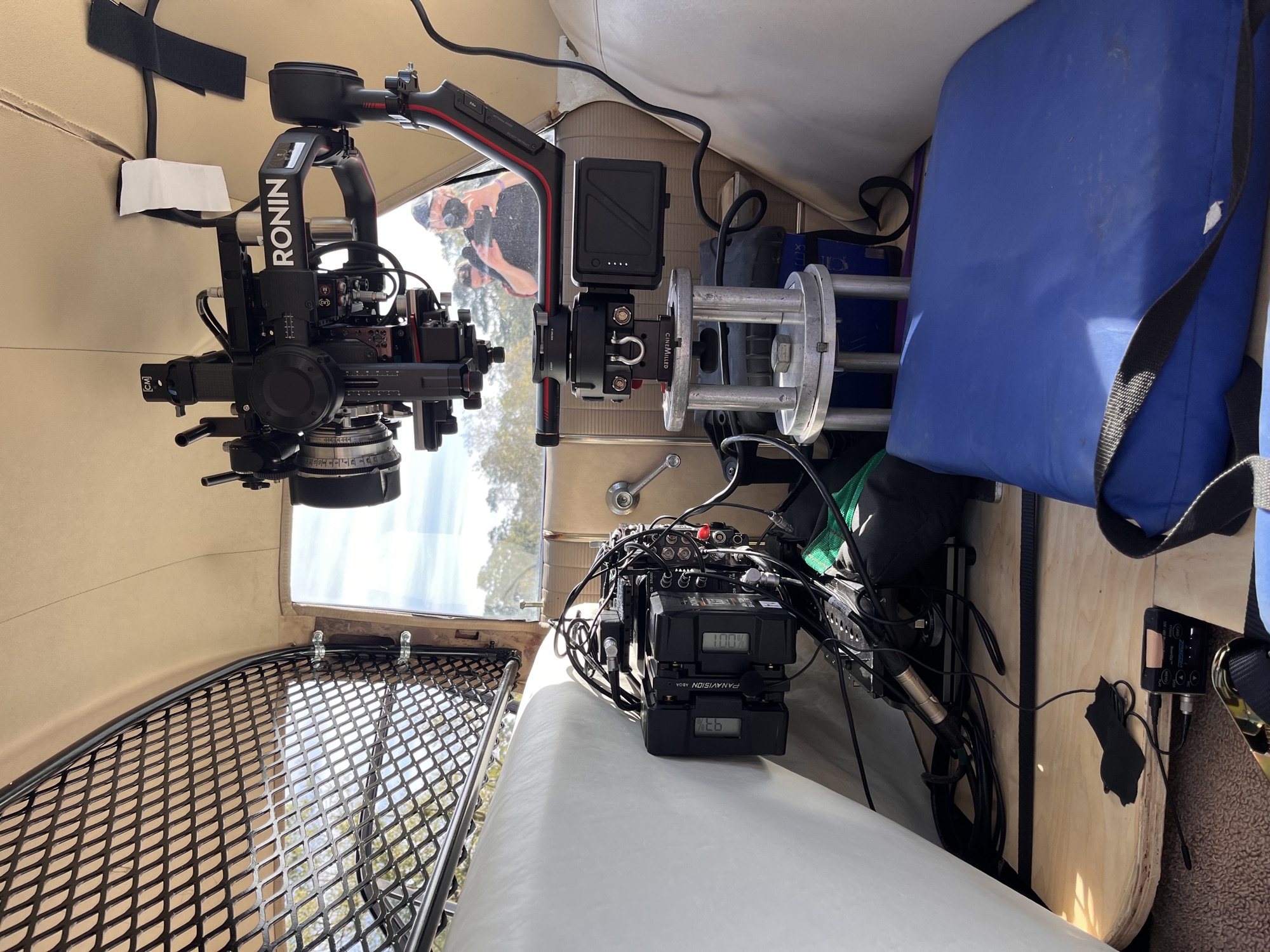 Ronin rigged inside a vehicle interior with speed rail and battery power